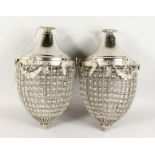 A LARGE PAIR OF PINEAPPLE SHAPED CRYSTAL LIGHTS. 22ins long.