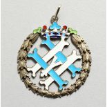 A RUSSIAN SILVER BLUE AND WHITE ENAMEL PENDANT.