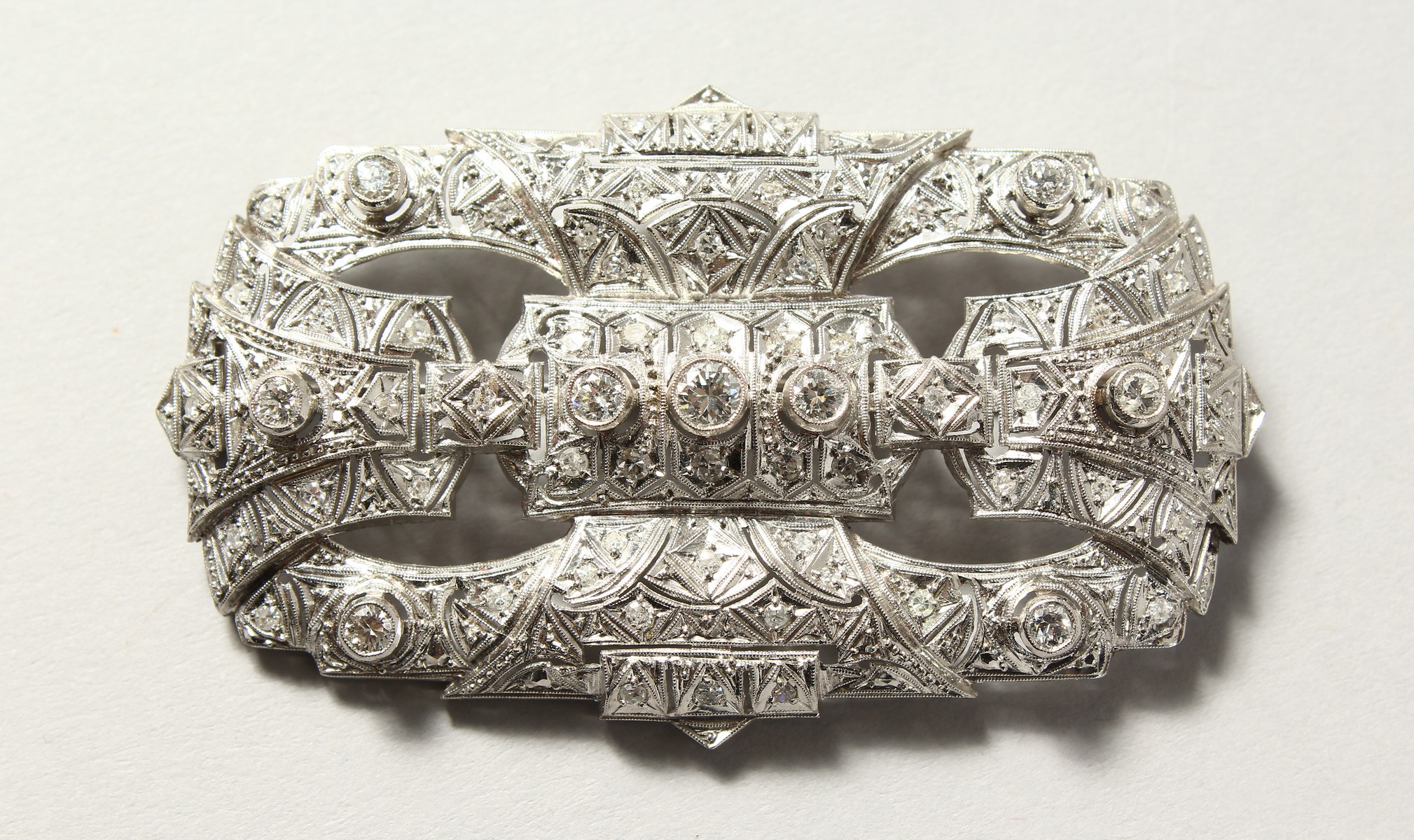 A SUPERB 18CT WHITE GOLD AND DIAMOND ART DECO BROOCH. 7cms long x 3.75cms wide.