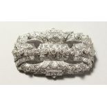 A SUPERB 18CT WHITE GOLD AND DIAMOND ART DECO BROOCH. 7cms long x 3.75cms wide.