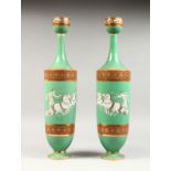 A TALL PAIR OF CONTINENTAL VASES decorated with a horse and chariot (Possibly Minton). 19ins high.
