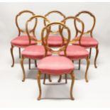 A GOOD SET OF SIX VICTORIAN CABRIOLE LEG DINING CHAIRS with padded seats.
