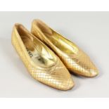 A PAIR OF CHANEL, SIZE 39.5, GOLD COLOUR SHOES.