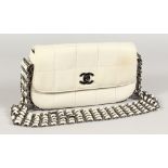 A VERY GOOD CHANEL LIMITED EDITION PADDED WHITE LEATHER BAG. 9ins wide, with five-row metal and