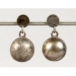 A PAIR OF SILVER EARRINGS.