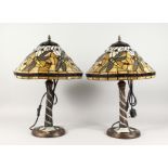 A GOOD PAIR OF DRAGONFLY LAMPS in the Tiffany style.