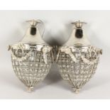 A SMALL PAIR OF PINEAPPLE SHAPED CRYSTAL LIGHTS. 13ins long.