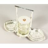 A SILVER PLATE AND CUT GLASS HEART SHAPED JAM SET.