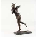 A WINGED BRONZE NAKED LADY on a marble base. 22ins high.