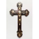 A CHINESE ROSEWOOD CRUCIFIX, with mother-of-pearl inlaid floral decoration. 17ins x 9.5ins.
