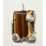 A SILVER AND TIGER'S EYE PENDANT.