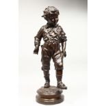 CHARLES ANFRIE (1833-1905) FRENCH "LA PREMIERE CULOTTE". A SUPERB BRONZE OF A YOUNG BOY. Signed,