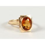 A 9CT YELLOW GOLD SINGLE STONE TOURMALINE RING.