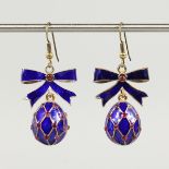 A GOOD PAIR OF RUSSIAN BLUE ENAMEL EGG EARRINGS with bows.