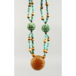 A GOOD ISLAMIC CORAL AND TURQUOISE NECKLACE.