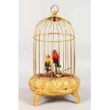 AN AUTOMATON BIRD IN A CAGE. 10ins high.