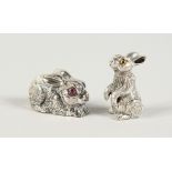 TWO CAST SILVER RABBIT.