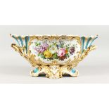 A LARGE LATE 19TH CENTURY CONTINENTAL OVAL BASKET, edged in gilt and painted with flowers. 18ins