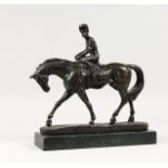 A GOOD BRONZE HORSE AND JOCKEY on a marble base. 10.5ins high.
