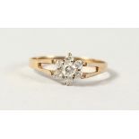 A 9CT GOLD DIAMOND FLOWER CLUSTER RING.