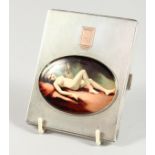 AN ENGINE TURNED SILVER CIGARETTE CASE with oval nude. Birmingham 1938.