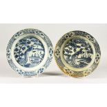 TWO CHINESE WANLI PERIOD BLUE AND WHITE PEACOCK DESIGN PLATES. 11ins diameter.