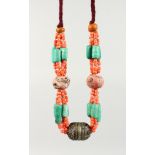 A GOOD ISLAMIC CORAL AND STONE NECKLACE.