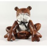 A LEATHER FROG DOORSTOP.