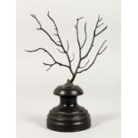 A BLACK TREE CORAL SPECIMEN, on an ebonised stand. 7ins high inc. stand.