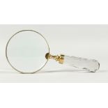 A MAGNIFYING GLASS WITH CRYSTAL HANDLE.