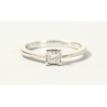 A PLATINUM SET PRINCESS CUT DIAMOND RING of 25 points.