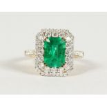 A SUPERB 18CT YELLOW GOLD, EMERALD (2.22CTS) AND DIAMOND RING, 1.15cts.