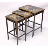 A 19TH CENTURY CHINESE LACQUER DECORATED NEST OF TABLES, decorated with views of landscapes and