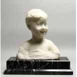 A GOOD LATE 19TH CENTURY CARVED WHITE MARBLE BUST OF A SMILING BOY, mounted on a rectangular