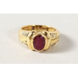 AN 18CT GOLD, RUBY AND DIAMOND RING.