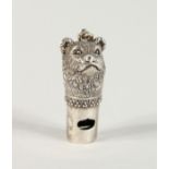 A CAST SILVER BEAR WHISTLE.