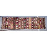 A FLATWEAVE KELIM RUNNER/HALL CARPET, with bands of Greek key and other geometric designs. 13ft 0ins