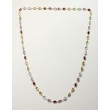 A GOOD 18CT YELLOW GOLD GEM SET NECKLACE.