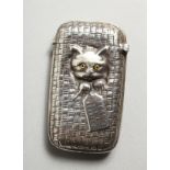 A SILVER CAT IN A BASKET VESTA CASE.