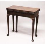 A GEORGE III MAHOGANY FOLDOVER TEA AND CARD TABLE, with rounded rectangular top on lappit carved