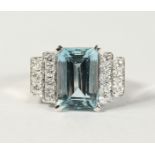 A GOOD 18CT WHITE GOLD, AQUAMARINE (4.5CTS) AND DIAMOND RING, 6.5cts.