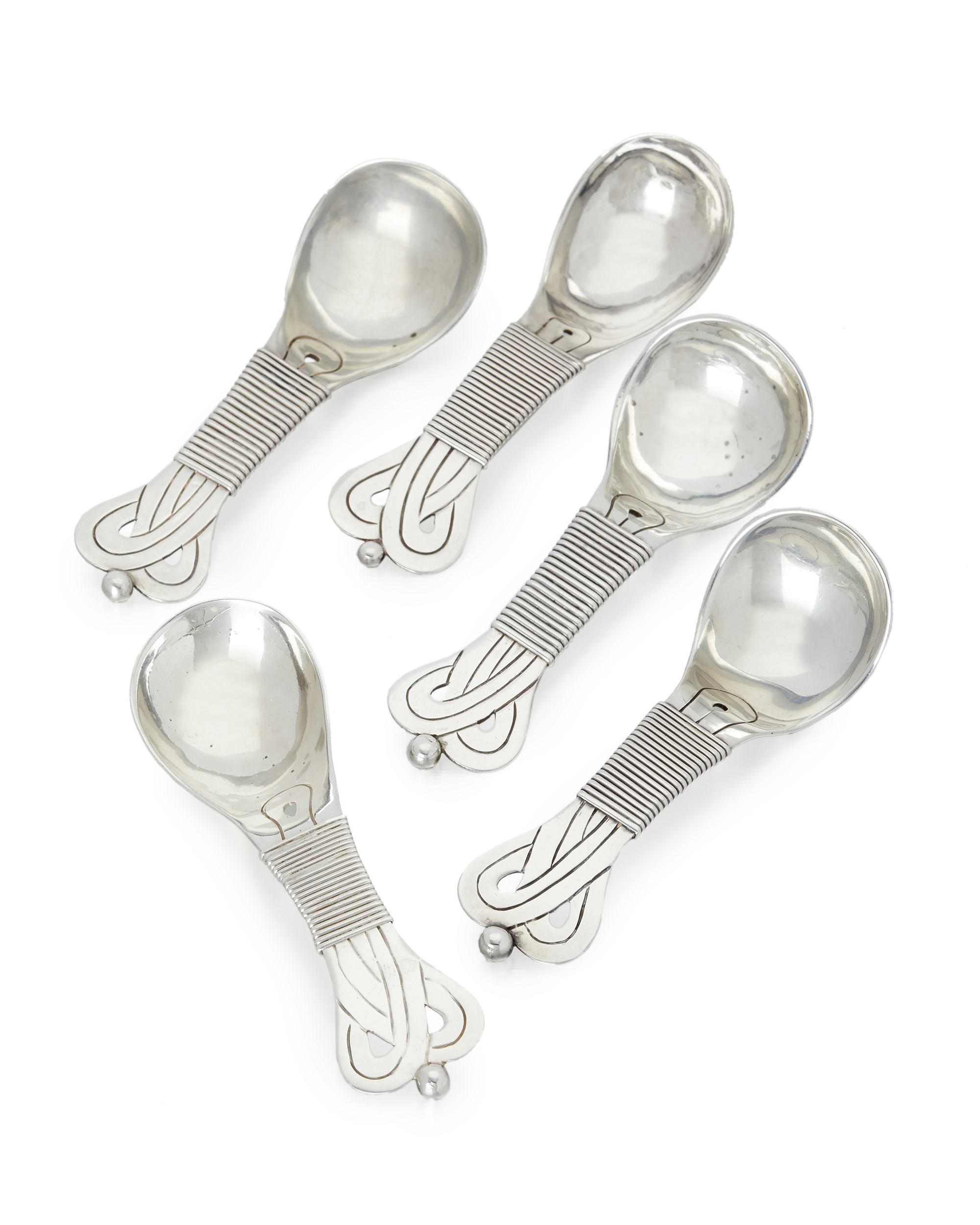 Five William Spratling sterling silver sugar spoons