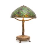 A Tiffany Studios patinated bronze table lamp