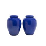 A pair of blue Bauer Pottery vases