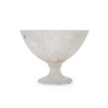 A hand-carved and polished rock crystal footed bowl