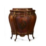 A French walnut and mahogany bombe cabinet