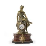 A Continental figural gilt-bronze and rouge marble clock