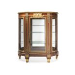 A French gilt-bronze vitrine cabinet