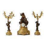 A French gilt and patinated bronze clock and garniture set