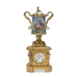 A gilt-bronze and porcelain table clock